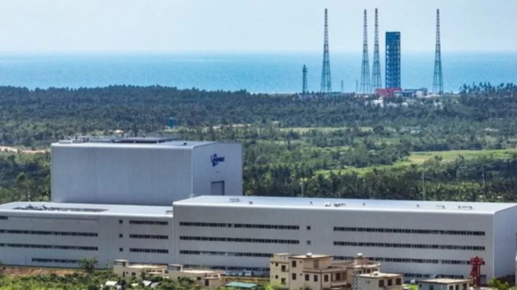 Hainan’s commercial launch site utilizes specialized towers and industrial integration to accelerate China’s space sector.