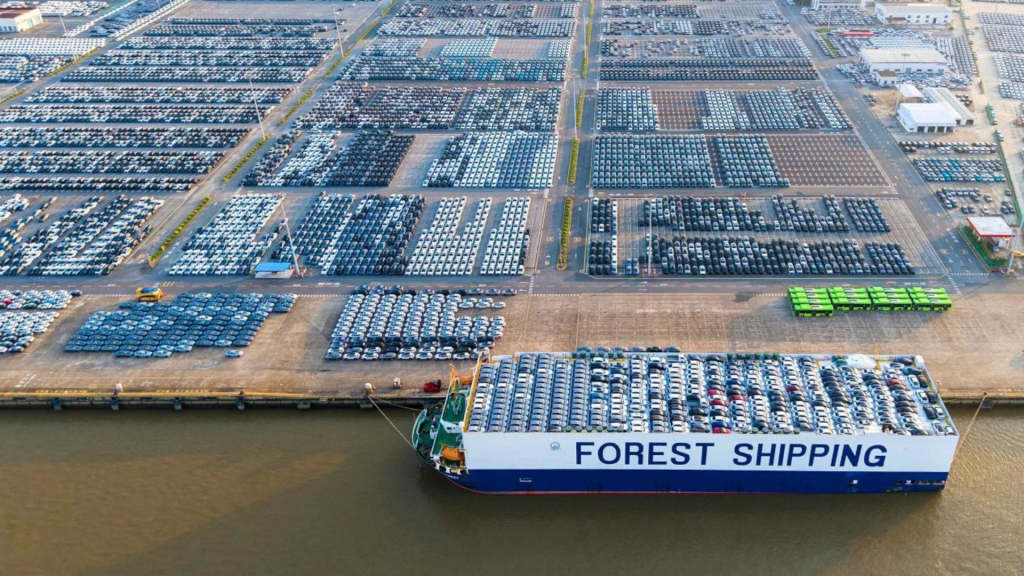 Guangzhou's transformation reflects China's commitment to high-quality development, shown by rows of Chinese-made vehicles lined up at a terminal in Nansha district, ready for export.