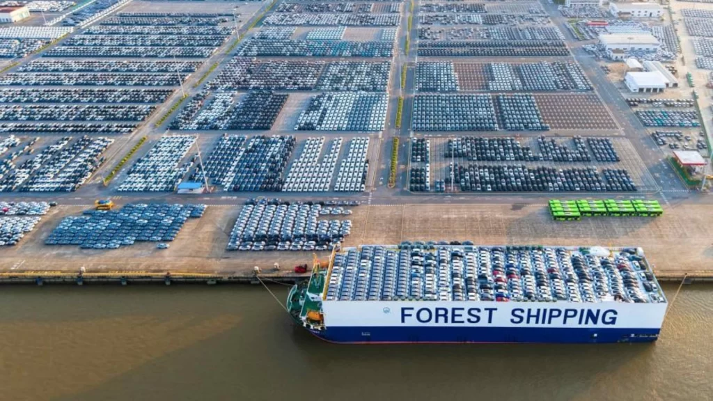 Aerial view of XPeng Motors' Zhaoqing plant surrounded by a dense automotive supplier industrial cluster.