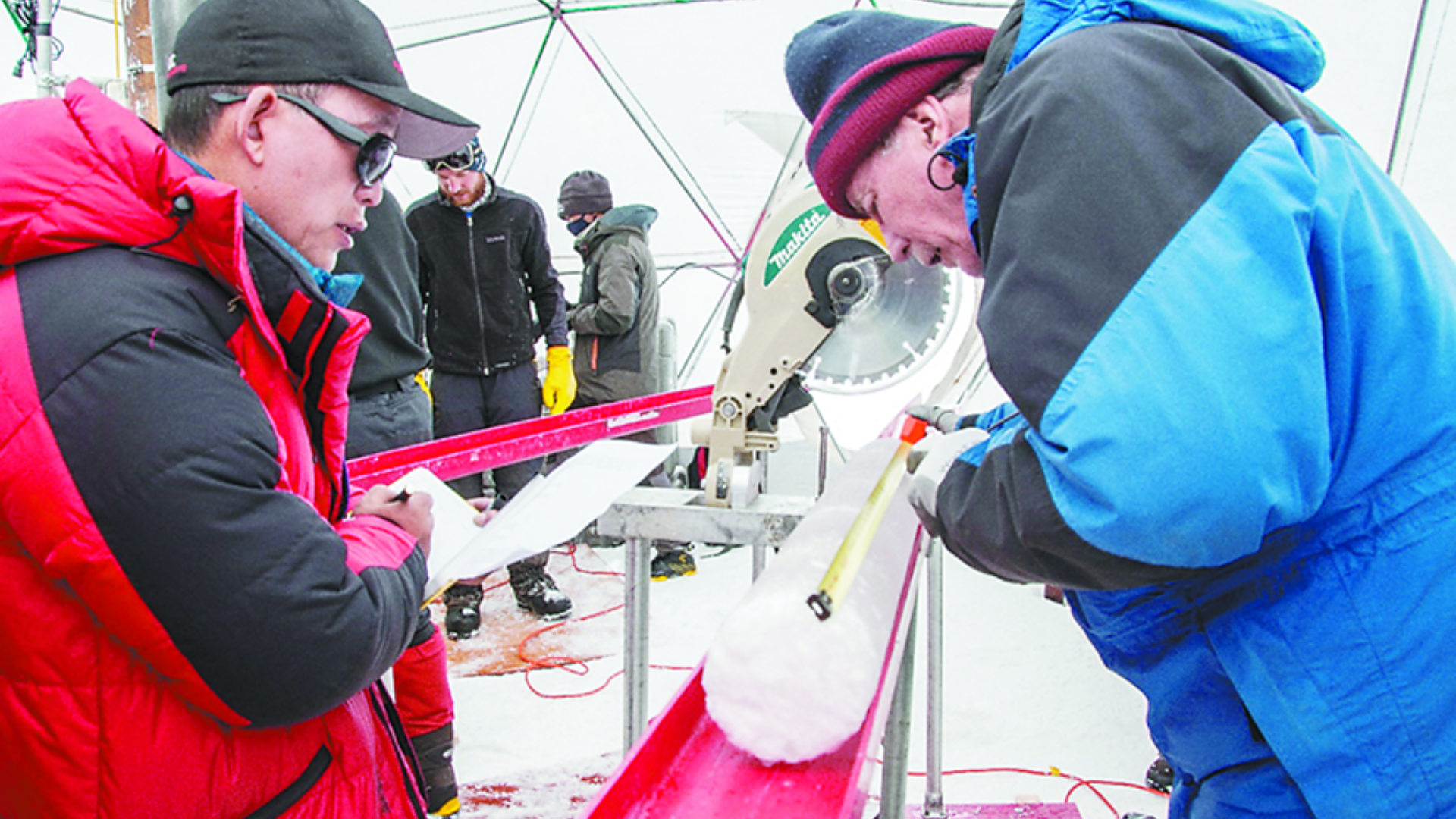 American glaciologist Lonnie Thompson and Chinese colleagues examining ancient ice cores from the Qinghai-Xizang Plateau.