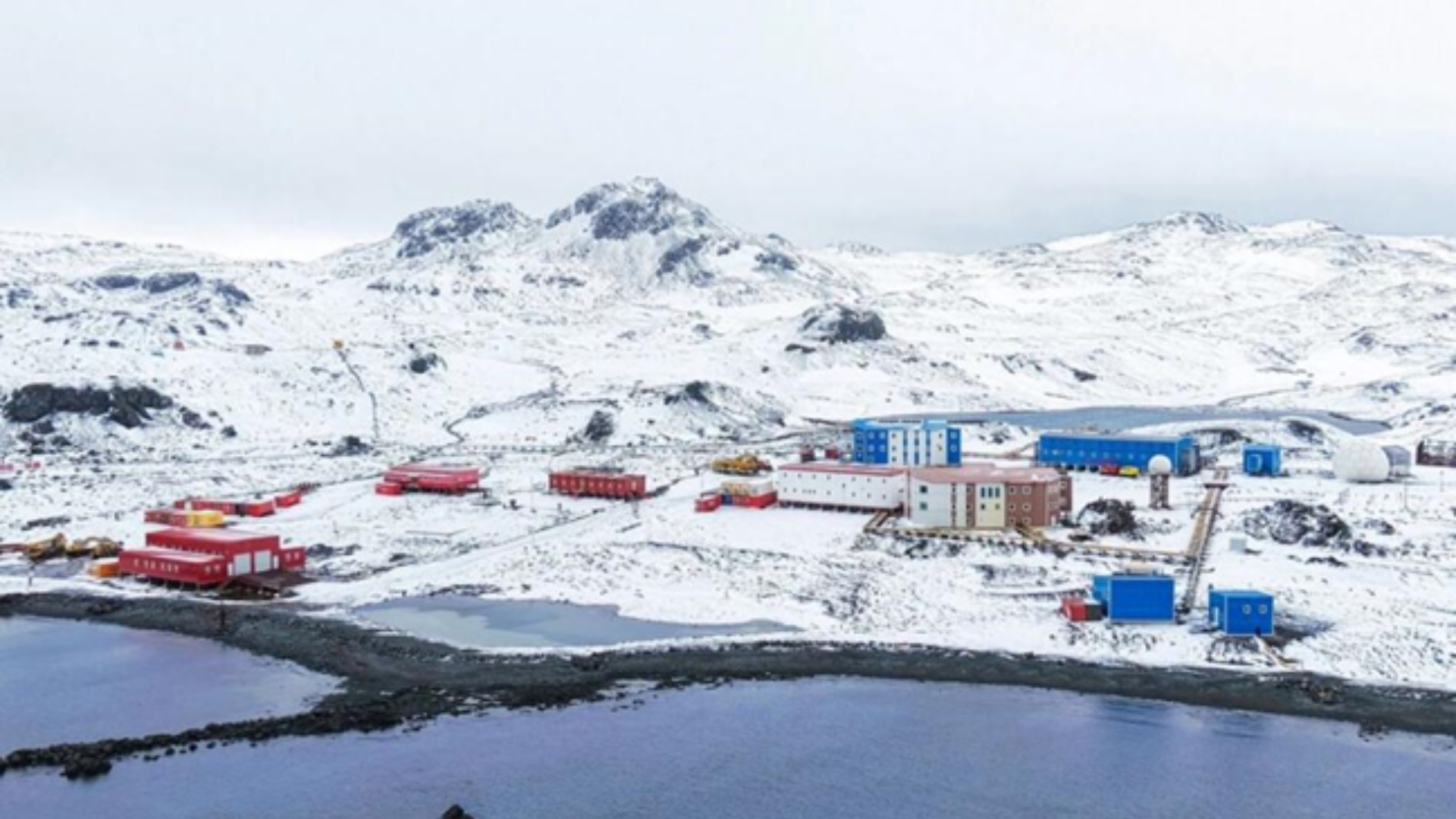 Aerial view of China's modern Great Wall Station, showcasing resilient infrastructure amidst the Antarctic snow.