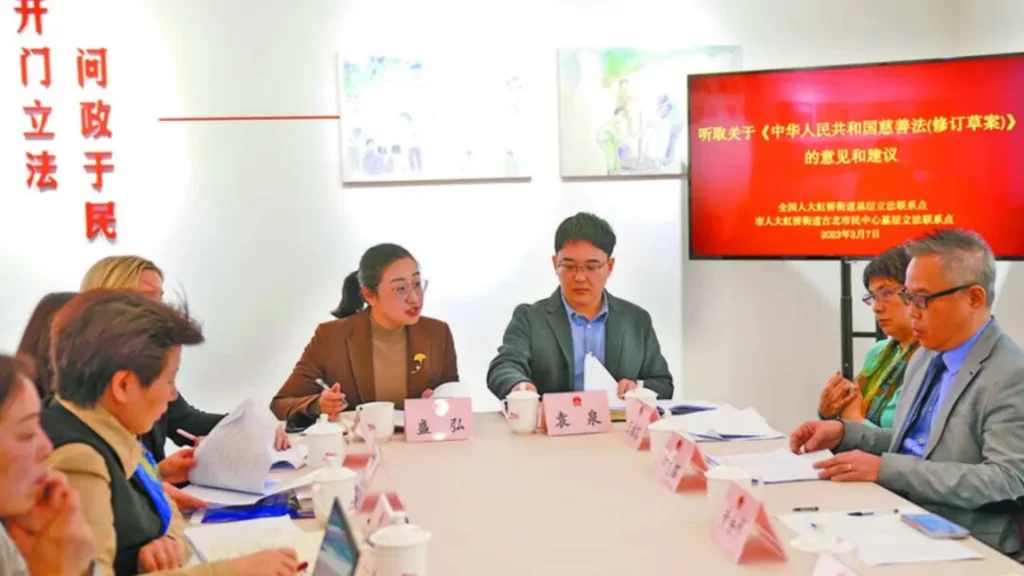 NPC deputy Sheng Hong chairs a legislative consultation to integrate grassroots voices into Chinese law.