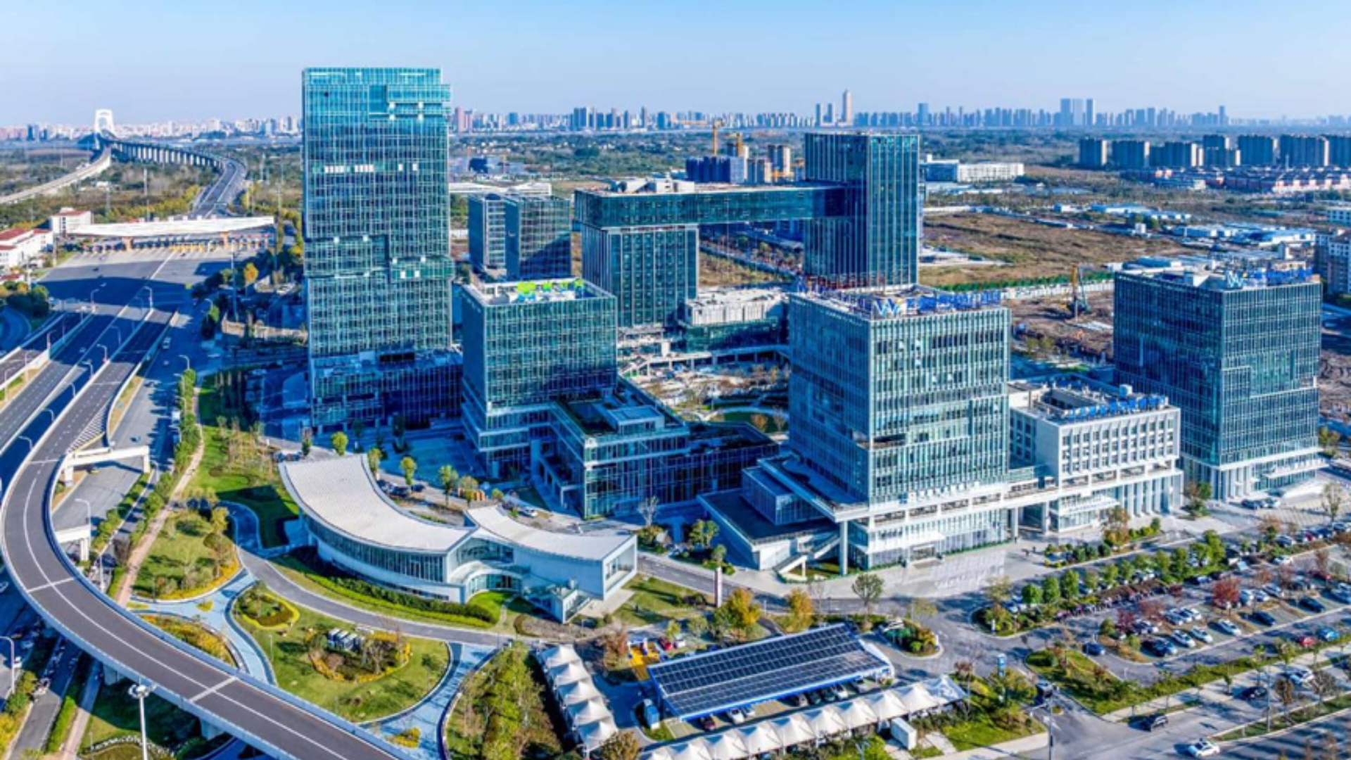 Aerial view of a high-tech Chinese business park, representing the explosive growth of the "token economy."
