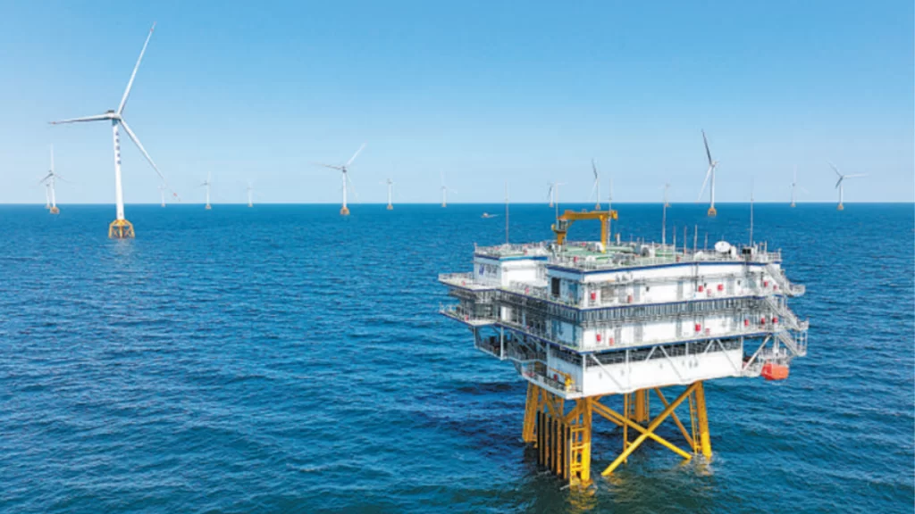 Offshore wind turbines and a substation platform in deep waters off China's Shandong Peninsula.