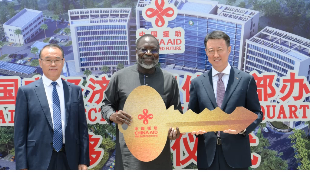 ECOWAS President receives symbolic key from Chinese officials for new China-funded "Eye of West Africa" headquarters.