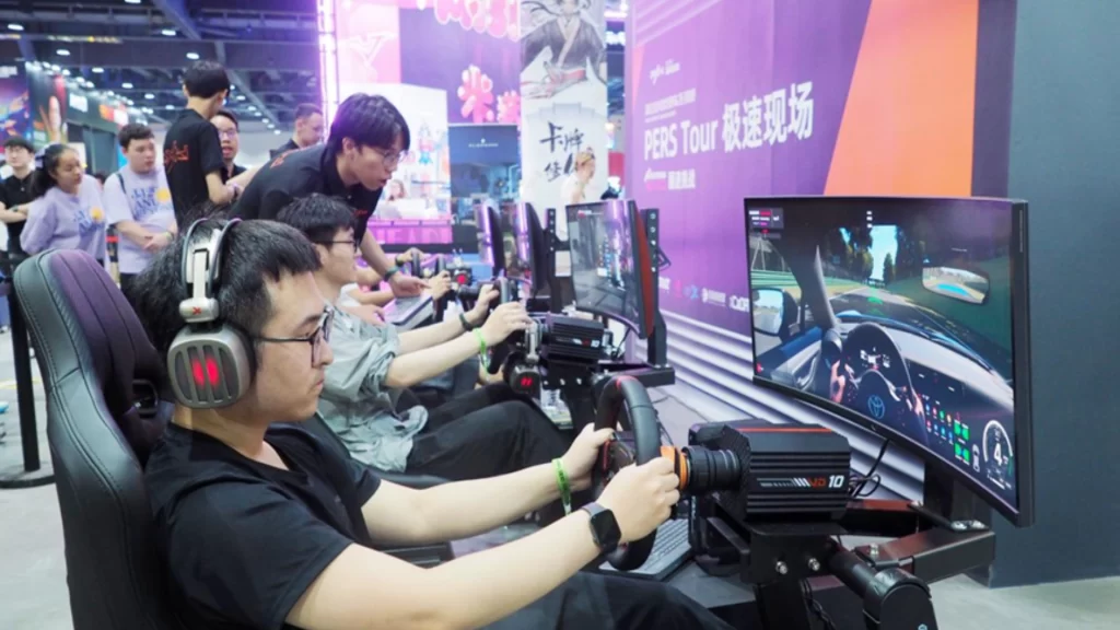 Young gamers use professional racing simulators at an e-sports event in China.