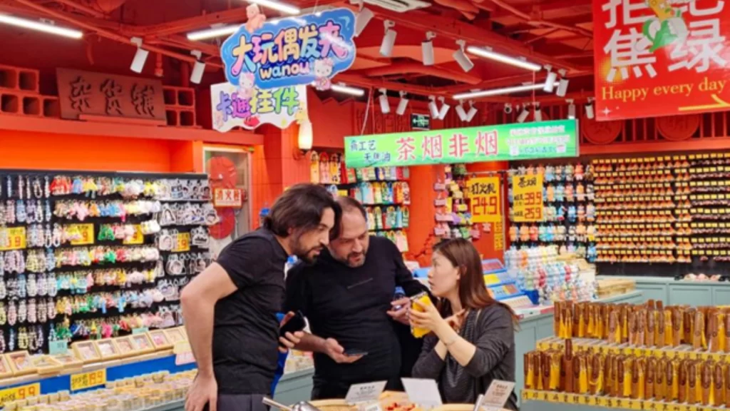 Foreign visitors exploring a vibrant Chinese market, experiencing the country's renowned sense of safety.