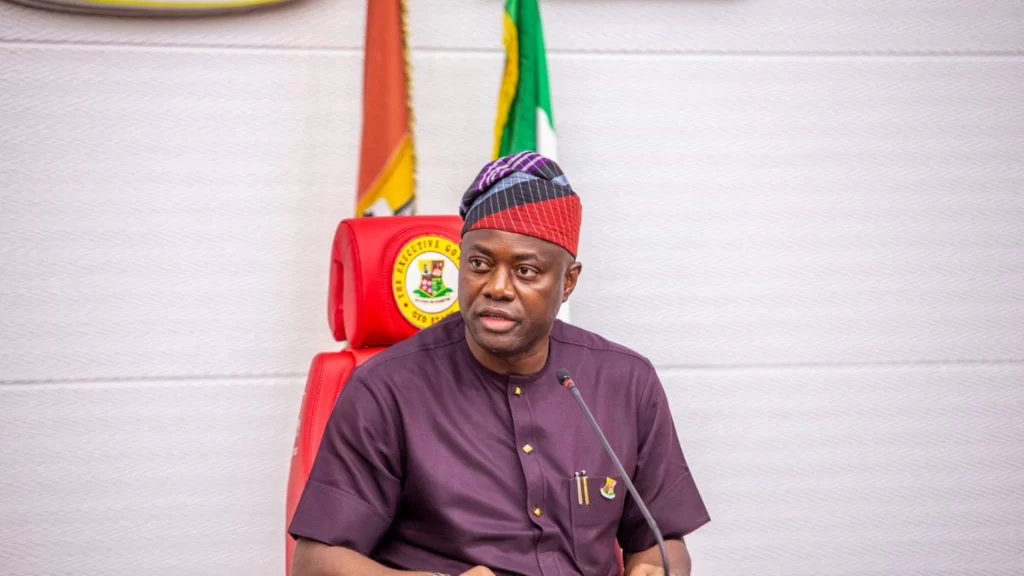 Oyo State Governor Seyi Makinde speaking at a podium during an official state function.