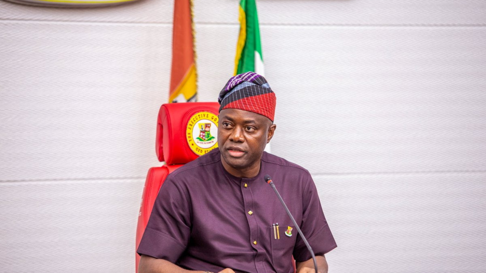 Oyo State Governor Seyi Makinde speaking at a podium during an official state function.