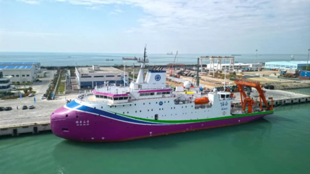 Research vessel docks at Hainan port, showcasing China’s innovative and sustainable marine economy development.