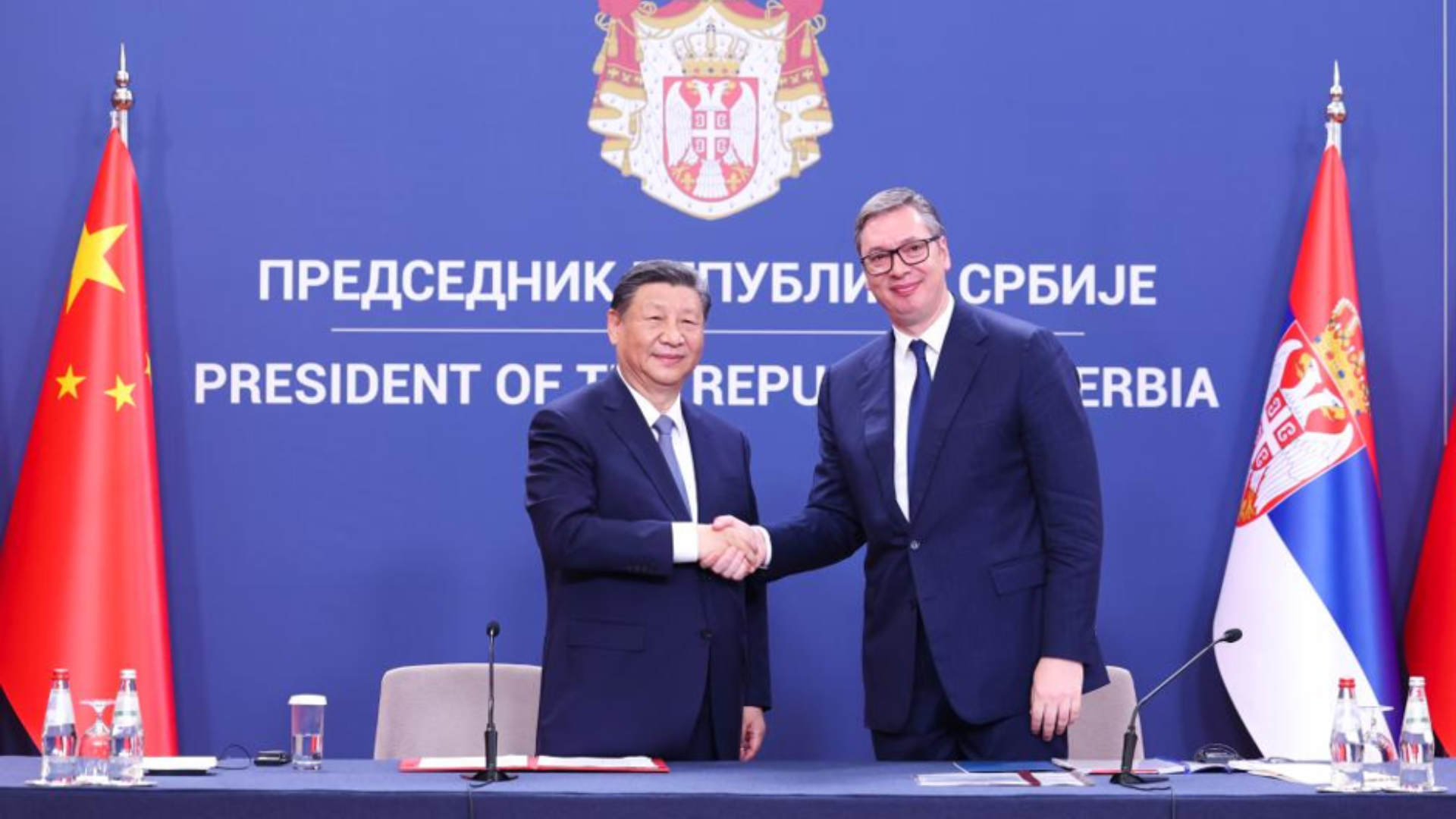 Chinese and Serbian presidents shake hands, strengthening strategic bilateral ties.