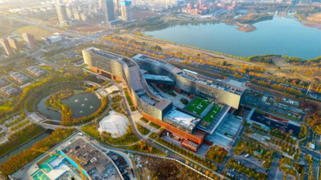 An aerial view of a modern technology park next to a scenic lake in Hefei.