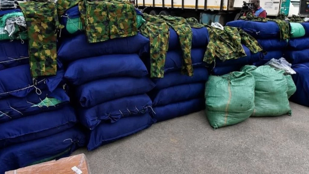 Recovered military camouflage uniforms and seized sacks during Lagos police intelligence-led operation.