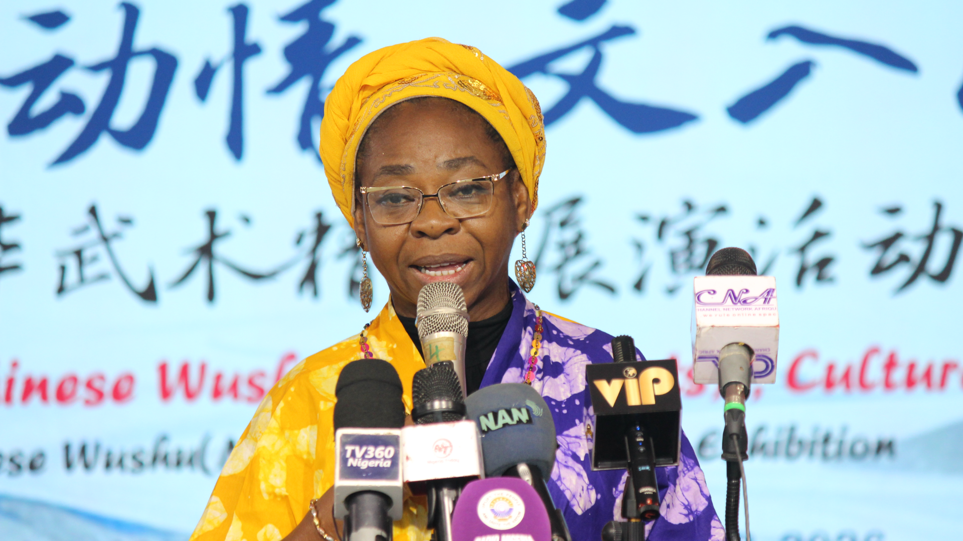 Nigerian speaker addresses China-Nigeria Wushu exhibition promoting cultural exchange and sports diplomacy in Abuja.