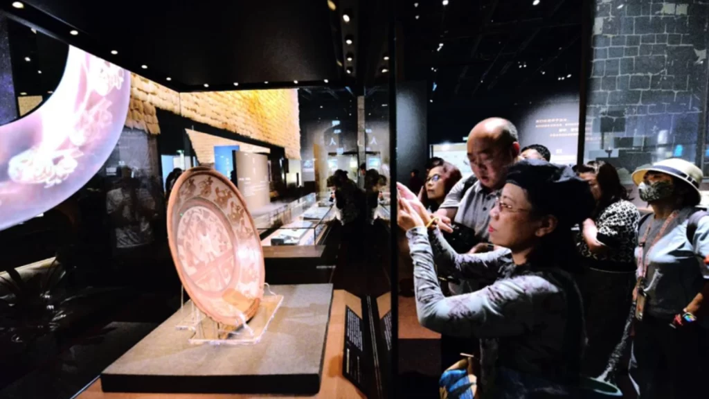 Visitors explore ancient Maya and Andean artifacts at landmark cultural exhibition in Beijing.