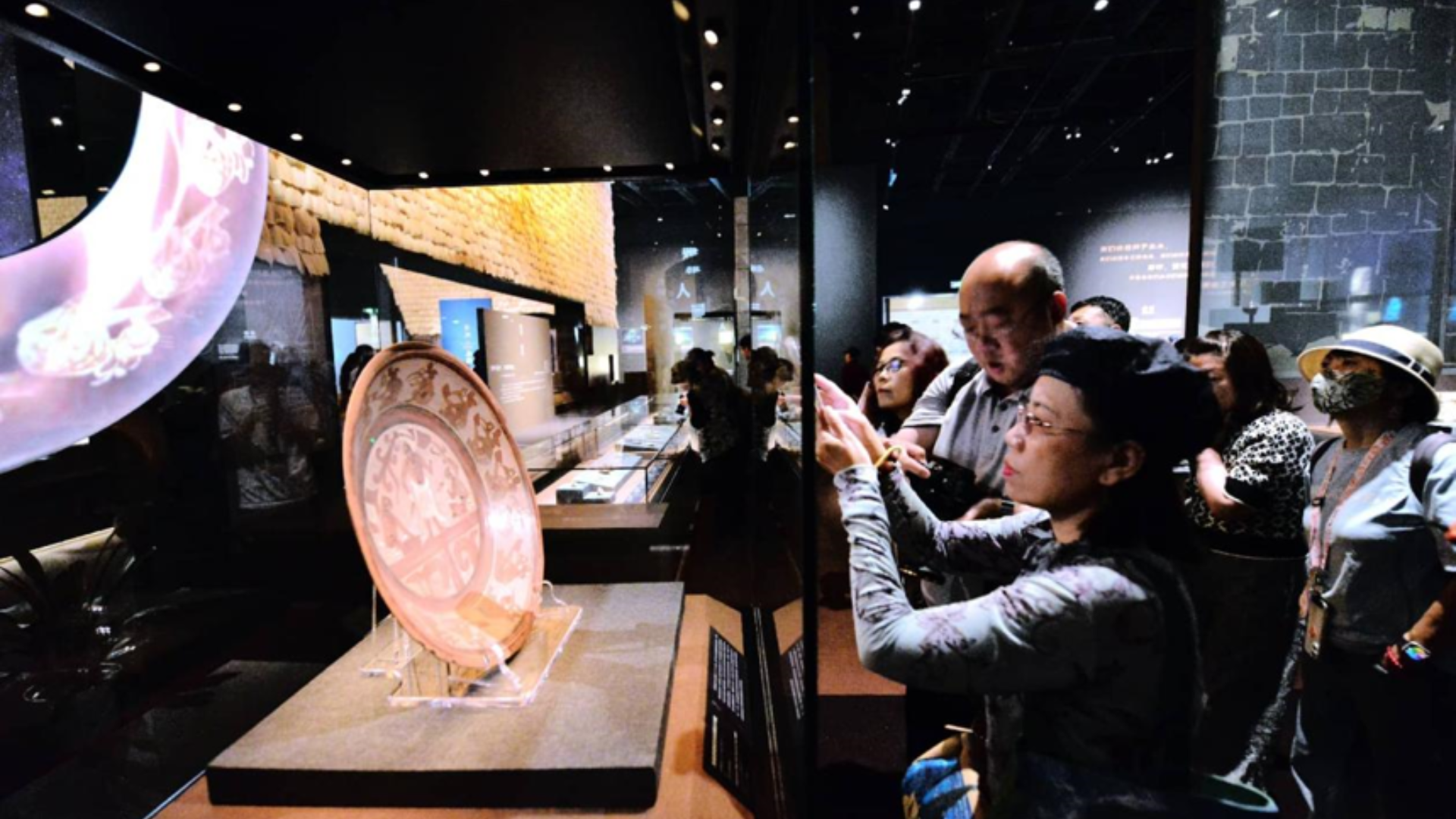 Visitors explore ancient Maya and Andean artifacts at landmark cultural exhibition in Beijing.