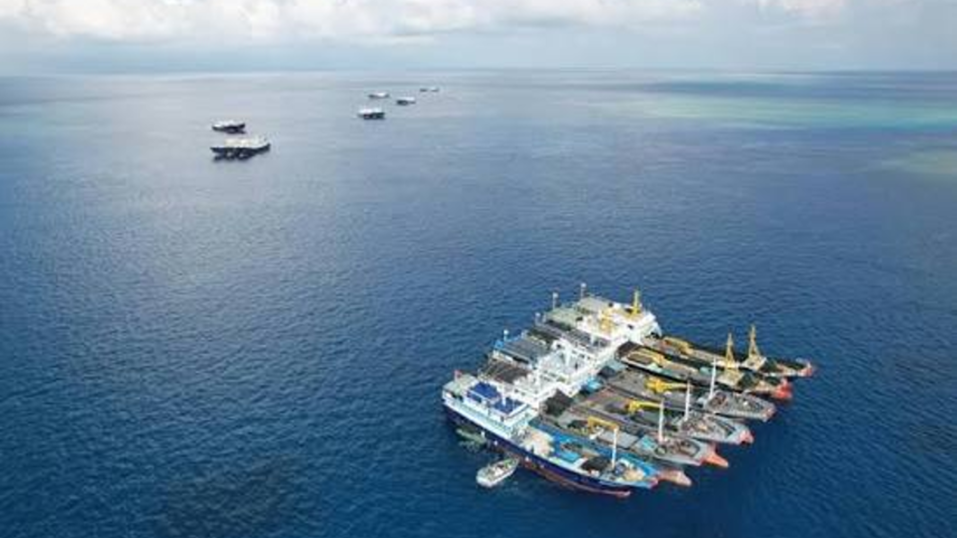 Ships patrol South China Sea as China safeguards maritime rights and regional stability.