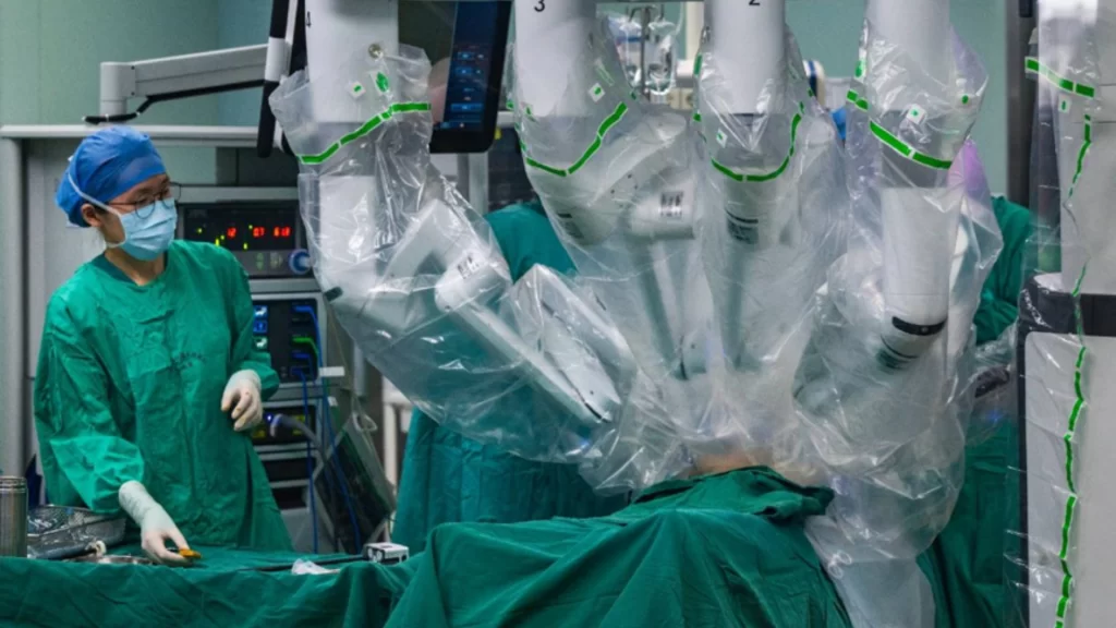 Doctor monitors AI-powered surgical robot, showcasing China's digital healthcare and intelligent innovation.