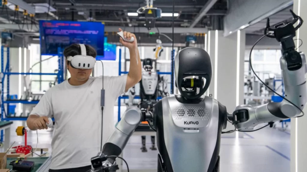 Staff trains humanoid robot for warehouse item picking using physical AI technology.