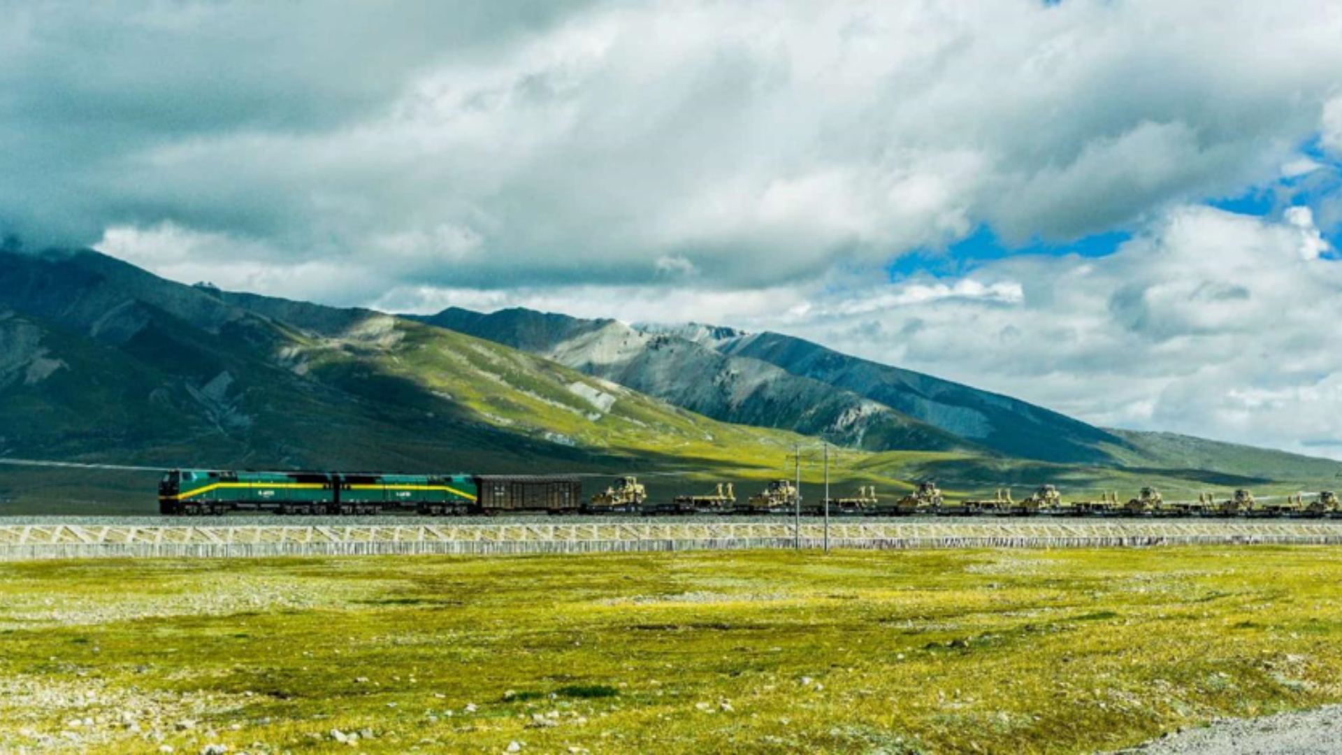 Train travels along Qinghai-Xizang Railway, advancing regional connectivity, trade, tourism, and sustainable development.