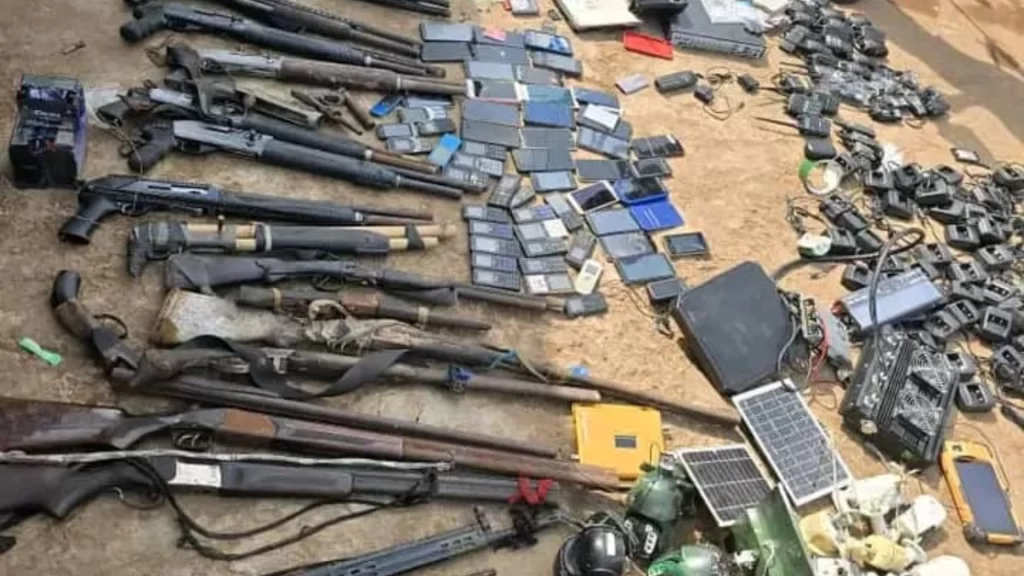 Suspected criminal armourer arrested in Imo State alongside a recovered cache of military-grade weapons.