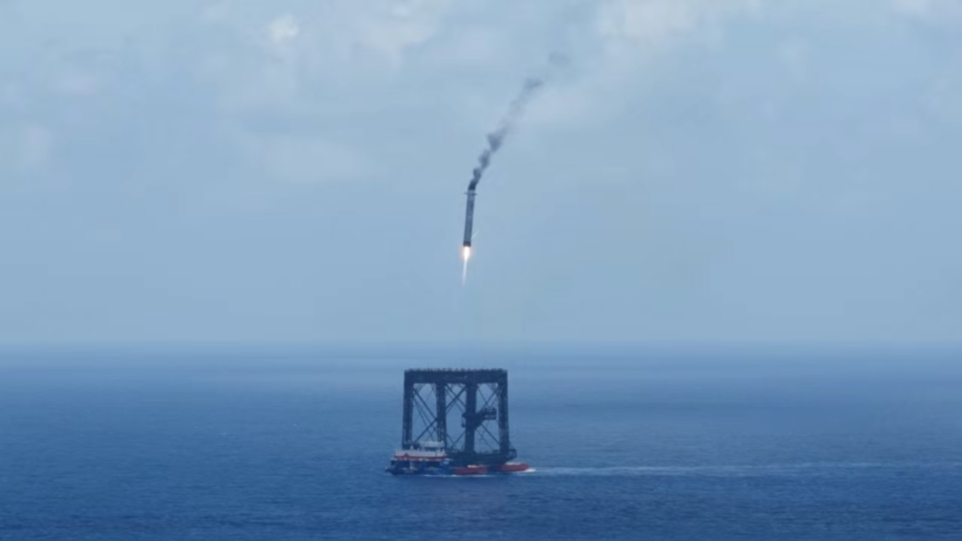 Long March-10B first stage recovered by offshore net-capture platform after launch.