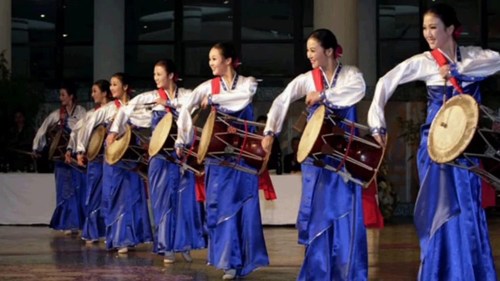 Nigerian and Korean percussionists perform Janggu, showcasing cultural exchange and traditional drumming in Lagos.