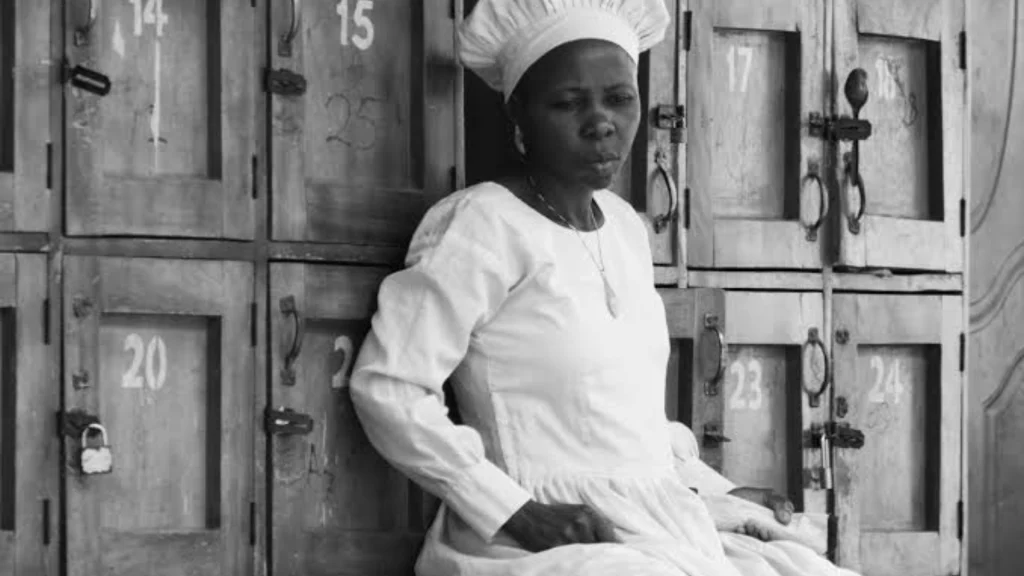 Photographs of white-robed Nigerian worshippers featured in Stephen Tayo's Lagos art exhibition.