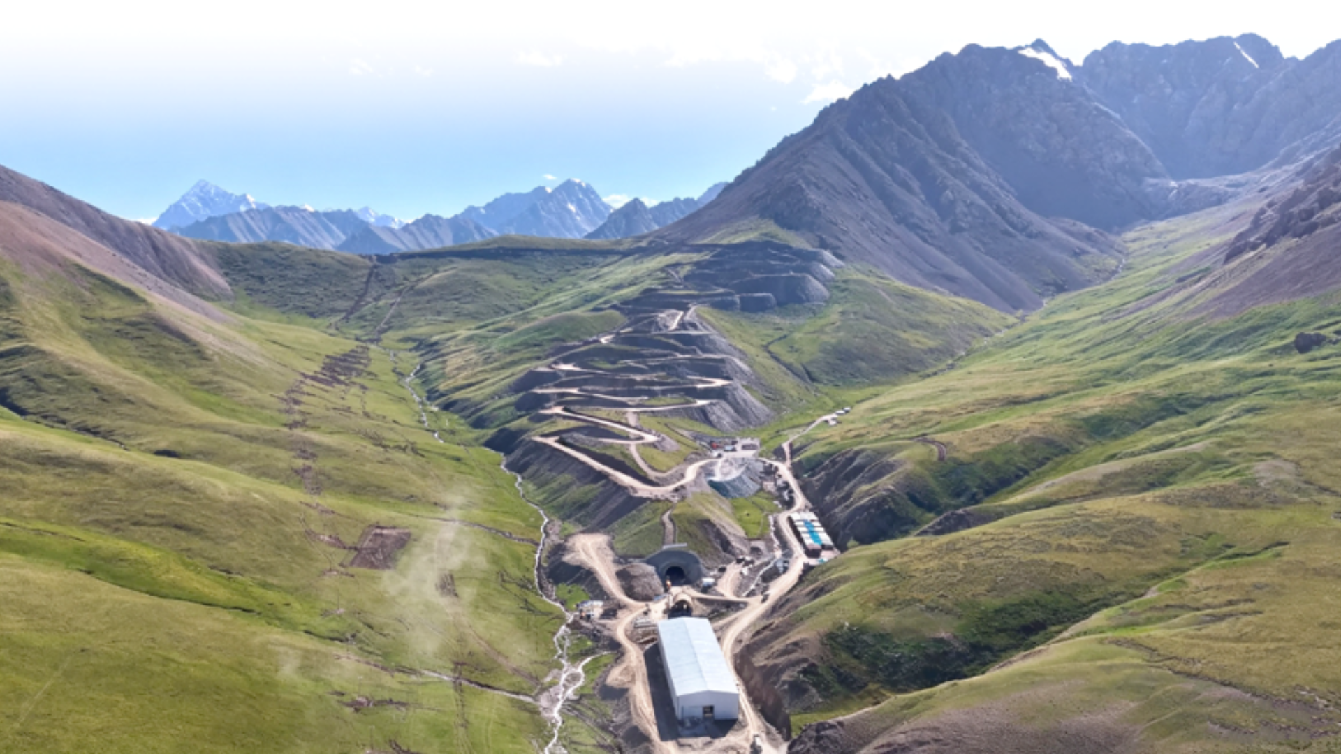 The Barskoon-Bedel Highway project under construction through a mountain pass in Kyrgyzstan.