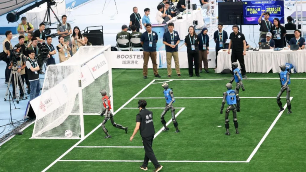 A five-on-five robot soccer match at the World Humanoid Robot Games in Beijing.