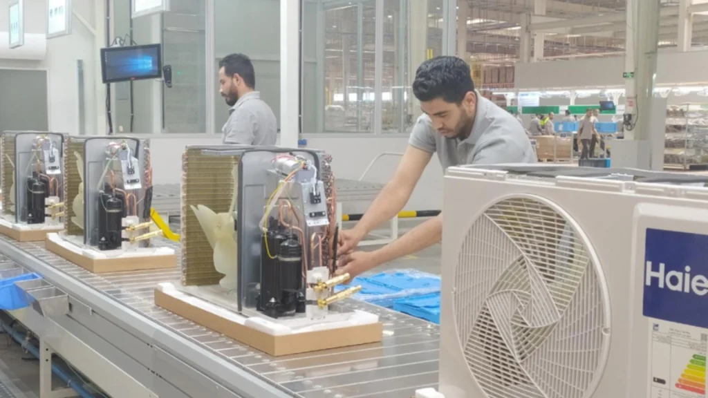 Workers assemble air conditioners at Haier Egypt Ecological Park in 10th of Ramadan City.