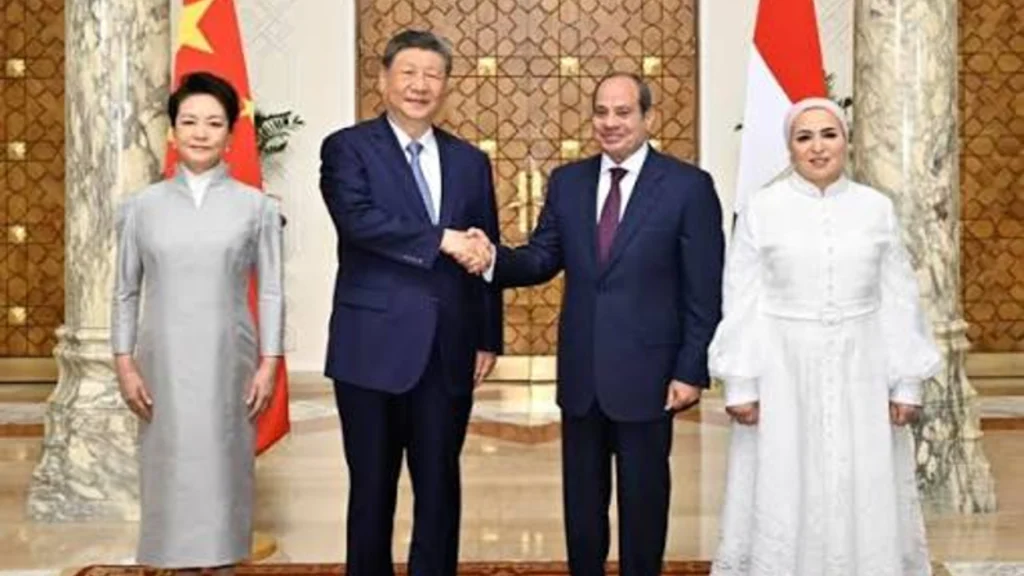 President Xi Jinping and President Abdel Fattah el-Sisi shaking hands during bilateral talks.