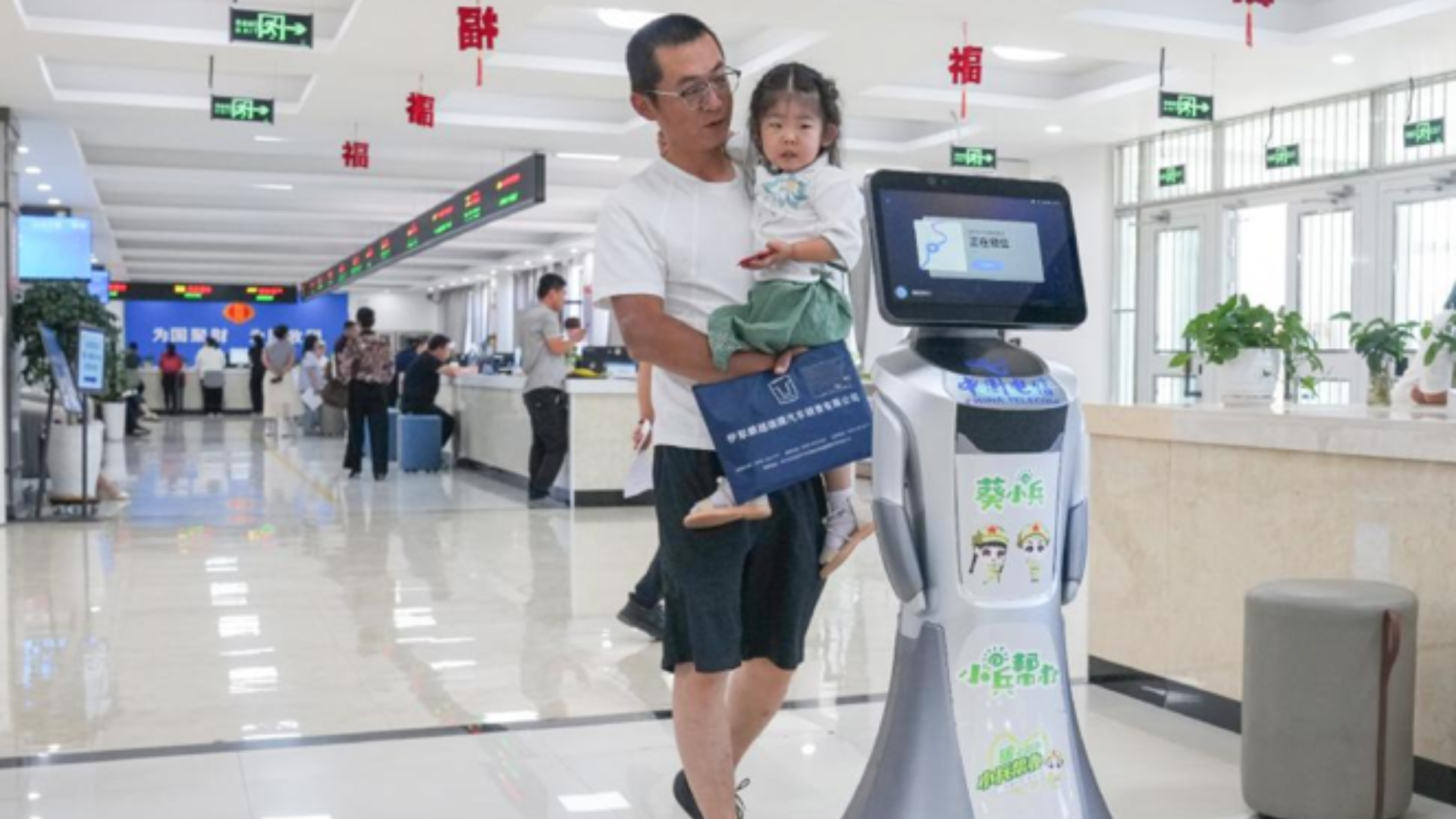 A robot assists visitors at a government service hall in Beitun, Xinjiang.